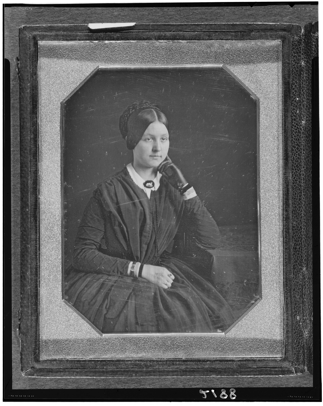 [Anna R.L. Baker, three-quarter length portrait, seated, with arm on table, wearing glove on one hand], [ca. 1846] — historic photograph
