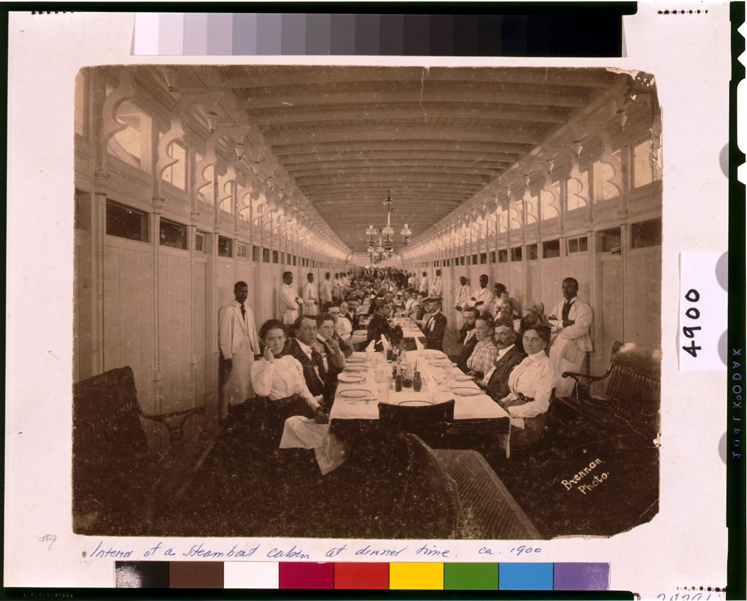 [Interior of a steamboat cabin at dinner time] / Brennan Photo., [1900] — historic photograph