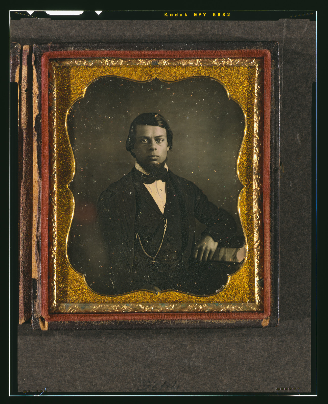 [Unidentified man with chin whiskers, half-length portrait, facing front, with arm resting on book], [ca. 1855] — historic photograph