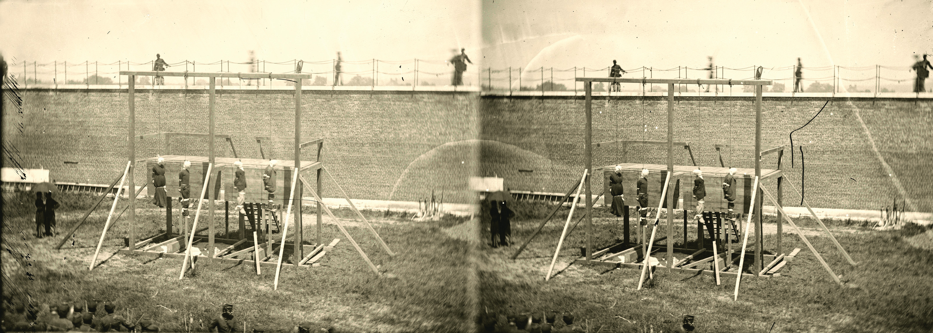 Washington, D.C. Hanging Bodies Of The Conspirators; Guards Only In Yard, July 7, 1865 — historic photograph