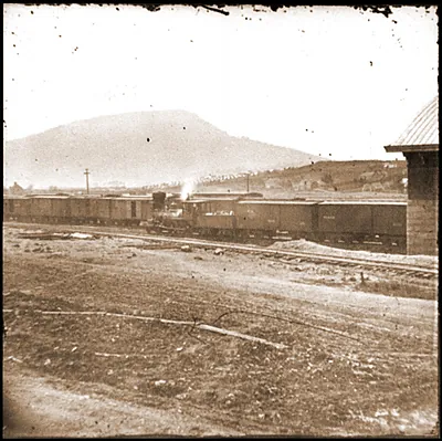 Chattanooga Tenn. U.S. military train at depot; Lookout Mountain in background