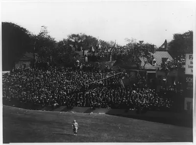 [Baseball game at old Griffith Stadium, Washington, D.C., view of spectators and one player on field]