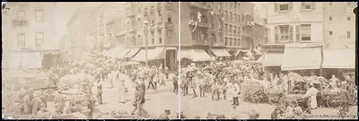 Crowded pushcart market street scene, New York
