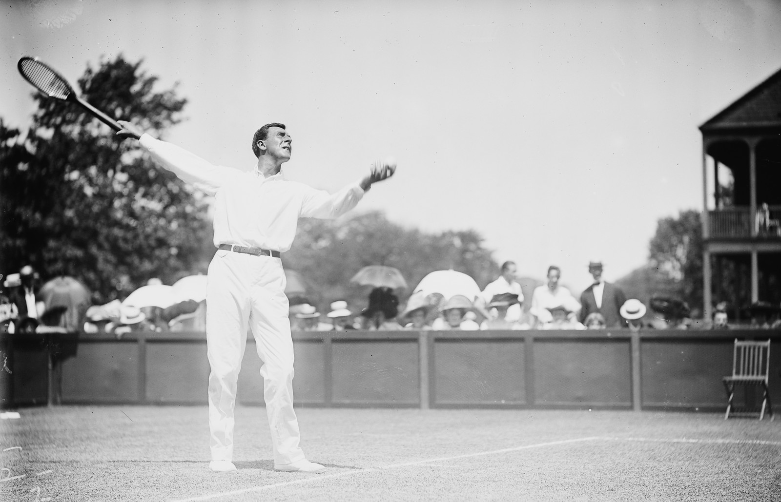 W.G. Grant, serving in tennis match, Casino, Newport, 8/20/09. — historic photograph