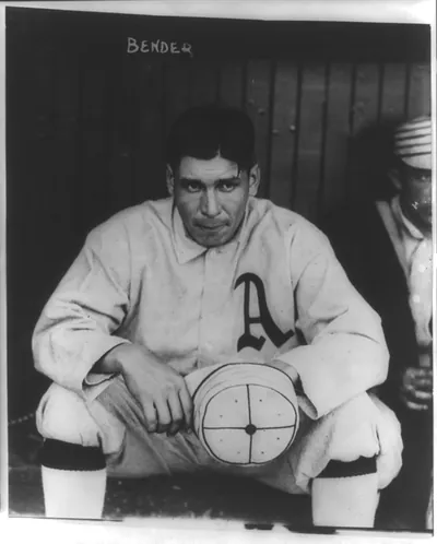 [Charles Albert (Chief) Bender, of the Philadelphia Athletics baseball team, three-quarter length portrait, seated, facing forward]