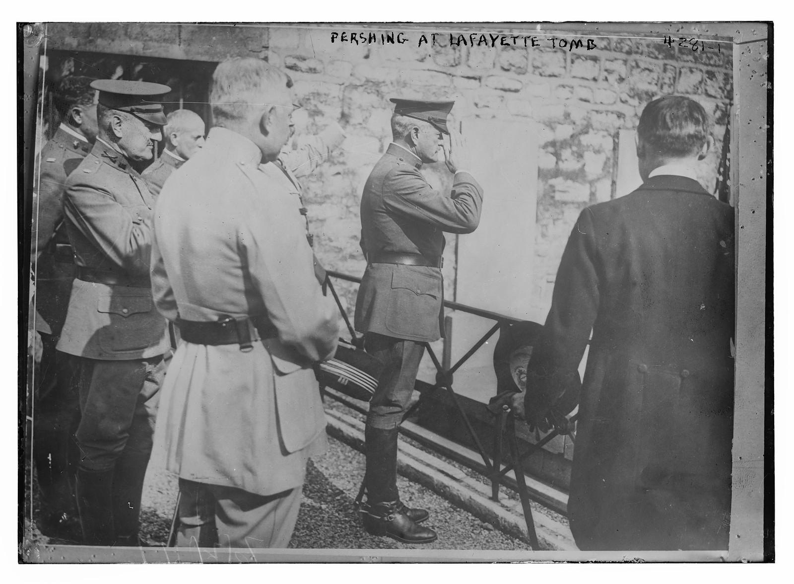 Gen. Pershing at Lafayette's tomb, n/a — historic photograph