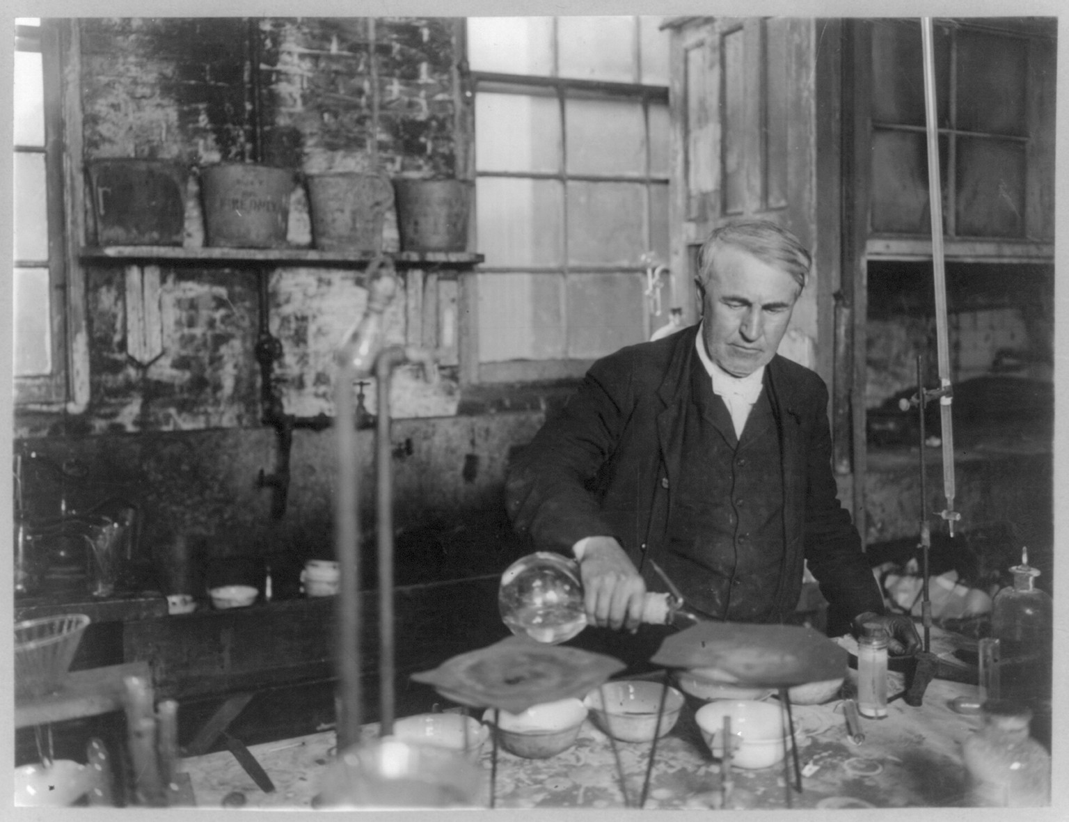 [Thomas Alva Edison, 1847-1931, half-length portrait, working in chemical laboratory], c1905. — historic photograph