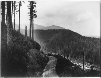 [Lone automobile on mountain Highway near Index, Washington]