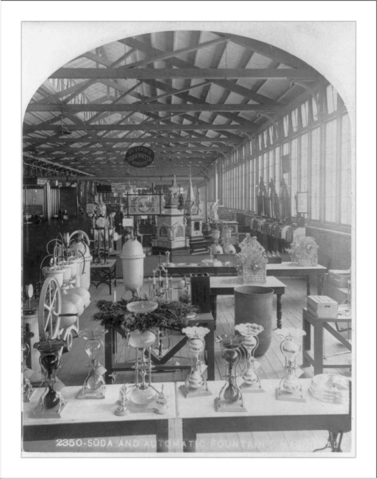 [Exhibit displays at Centennial Exhibition, Phila.: Soda water apparatus #2350], c1876. — historic photograph