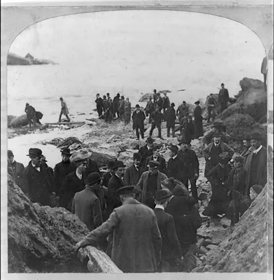 Niagara: Helping Mrs. [Anna E.] Taylor over the rocks below the falls