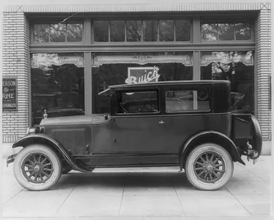 [New Buick in front of showcase of Emerson and Orme, Washington, D.C.]