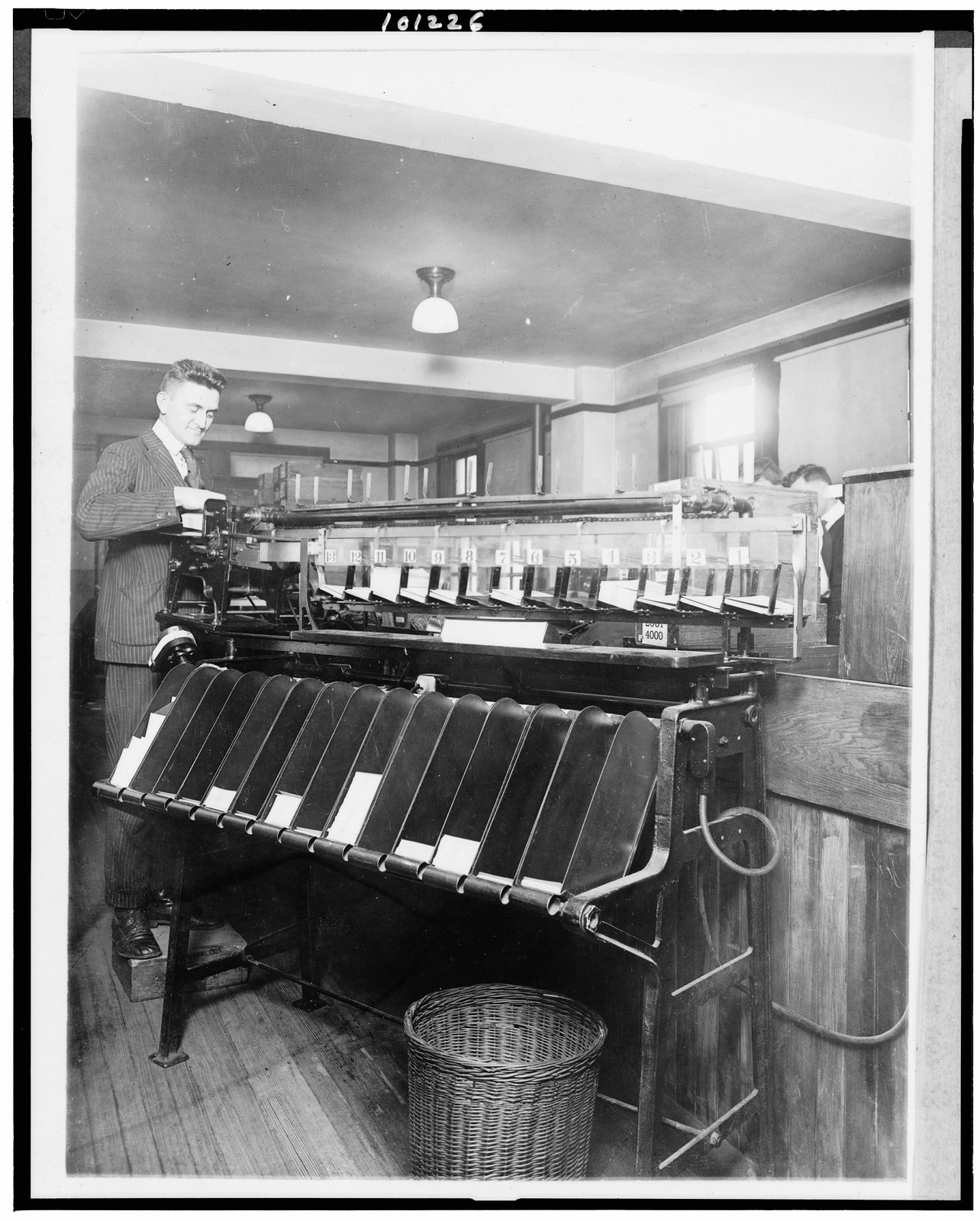 An Automatic sorting machine in use in the Census Office. ..., [between 1909 and 1920] — historic photograph