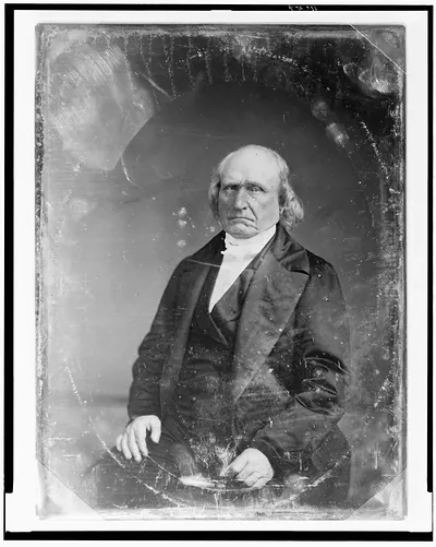 Seated older man in dark suit, daguerreotype portrait