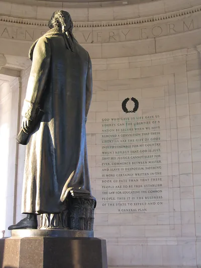 Back of Jefferson statue inside Jefferson Memorial with quotation