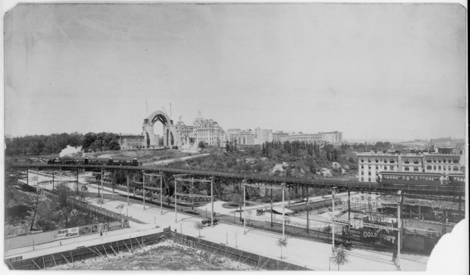 [New York City: Morningside Park & Cathedral Heights - showing elevated railroad. Cathedral constr. in background], c1902. — historic photograph