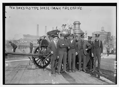 N.Y.'s old type horse drawn fire engine
