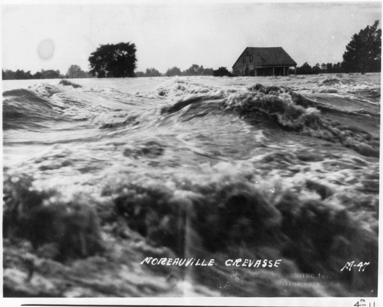 Moreauville, La., on Bayou des Glaises crevasse / Ewing, Inc., Batn Rouge, La., 1927 May 16. — historic photograph
