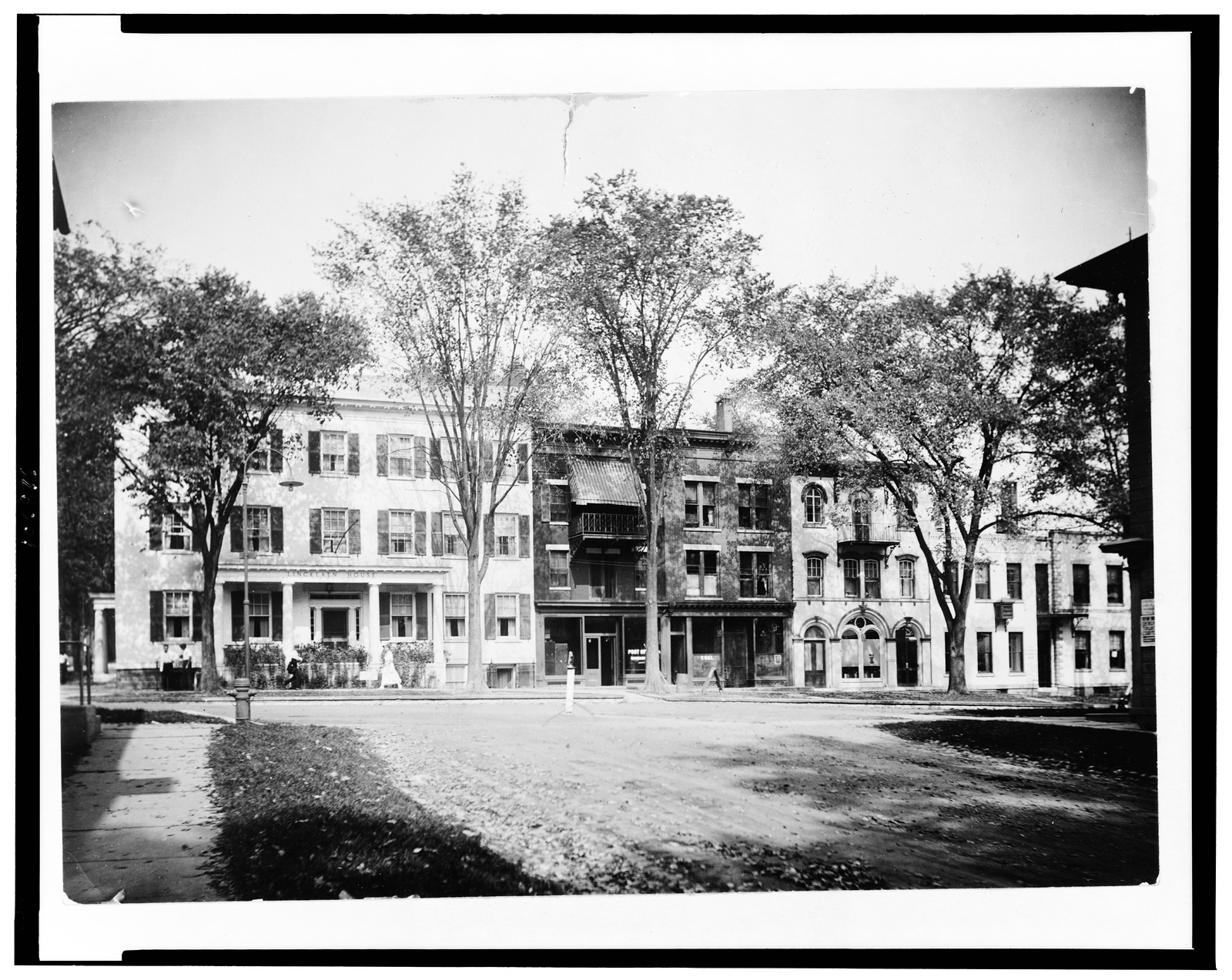 [Lincklaen House, the post office, a coal dealer, pharmacy, and bank, Cazenovia, New York], [between 1930 and 1940] — historic photograph