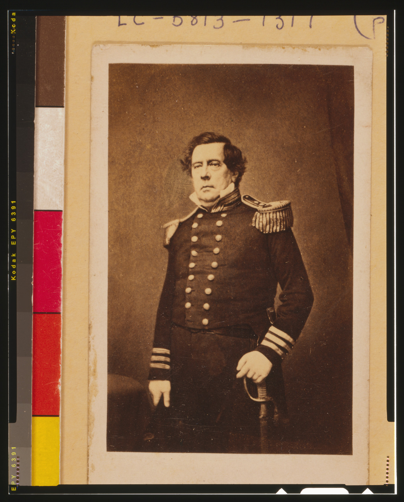 [Commodore Matthew C. Perry, three-quarter length portrait, standing, facing slightly left with left hand resting on sword], [between 1854 and 1858] — historic photograph
