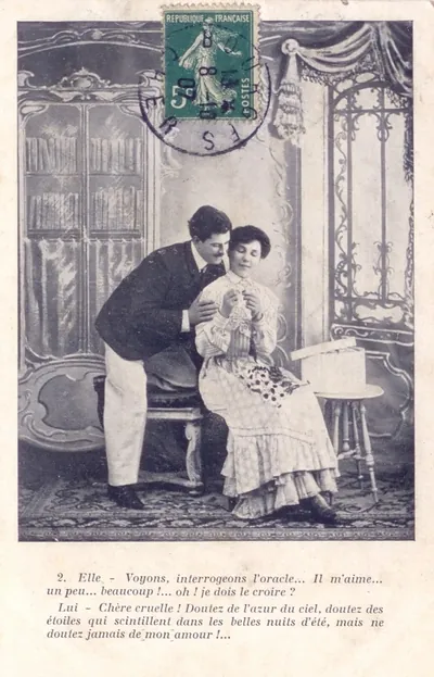 Romantic French postcard of a couple with printed verse