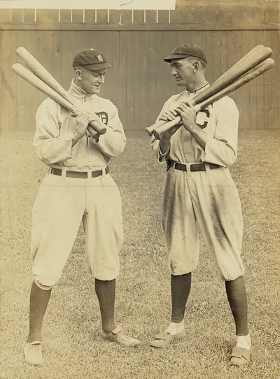 [Ty Cobb, Detroit, and Joe Jackson, Cleveland, standing alongside each other, each holding bats]