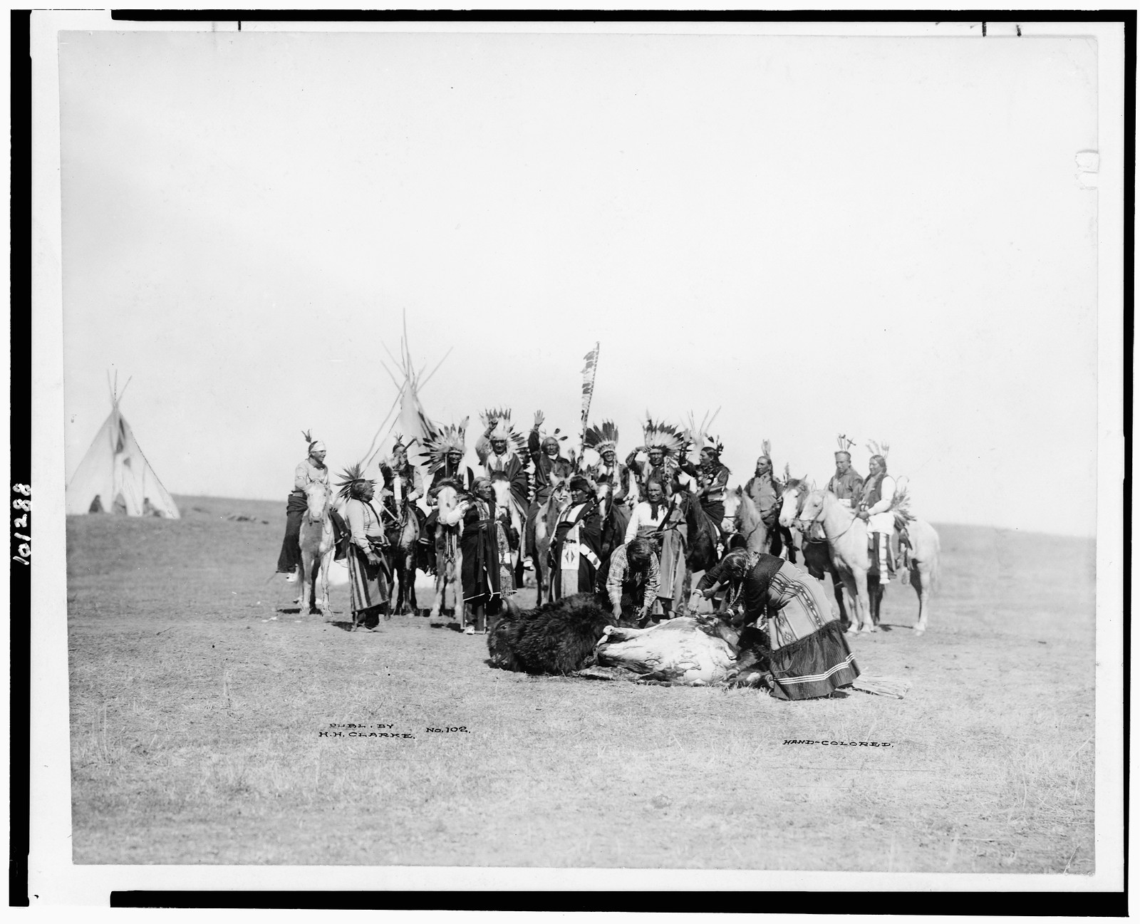 [Ponca Indian scouts skinning a buffalo, 101 Ranch, Bliss, Oklahoma], Publ. by H.H. Clarke, [1892-1930] — historic photograph