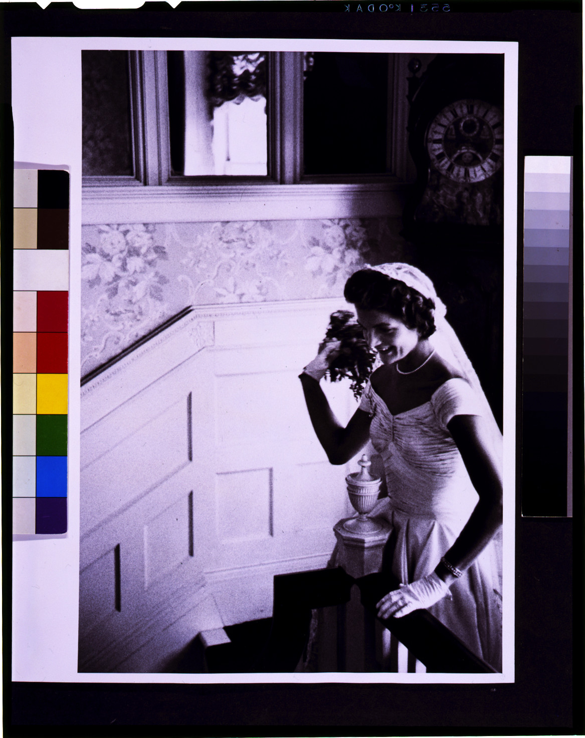 [Kennedy wedding--Jackie throwing the bouquet], [1953 Sept. 12] — historic photograph