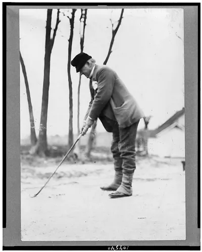 [John Marshall Harlan golfing, full-length portrait, standing, facing left]