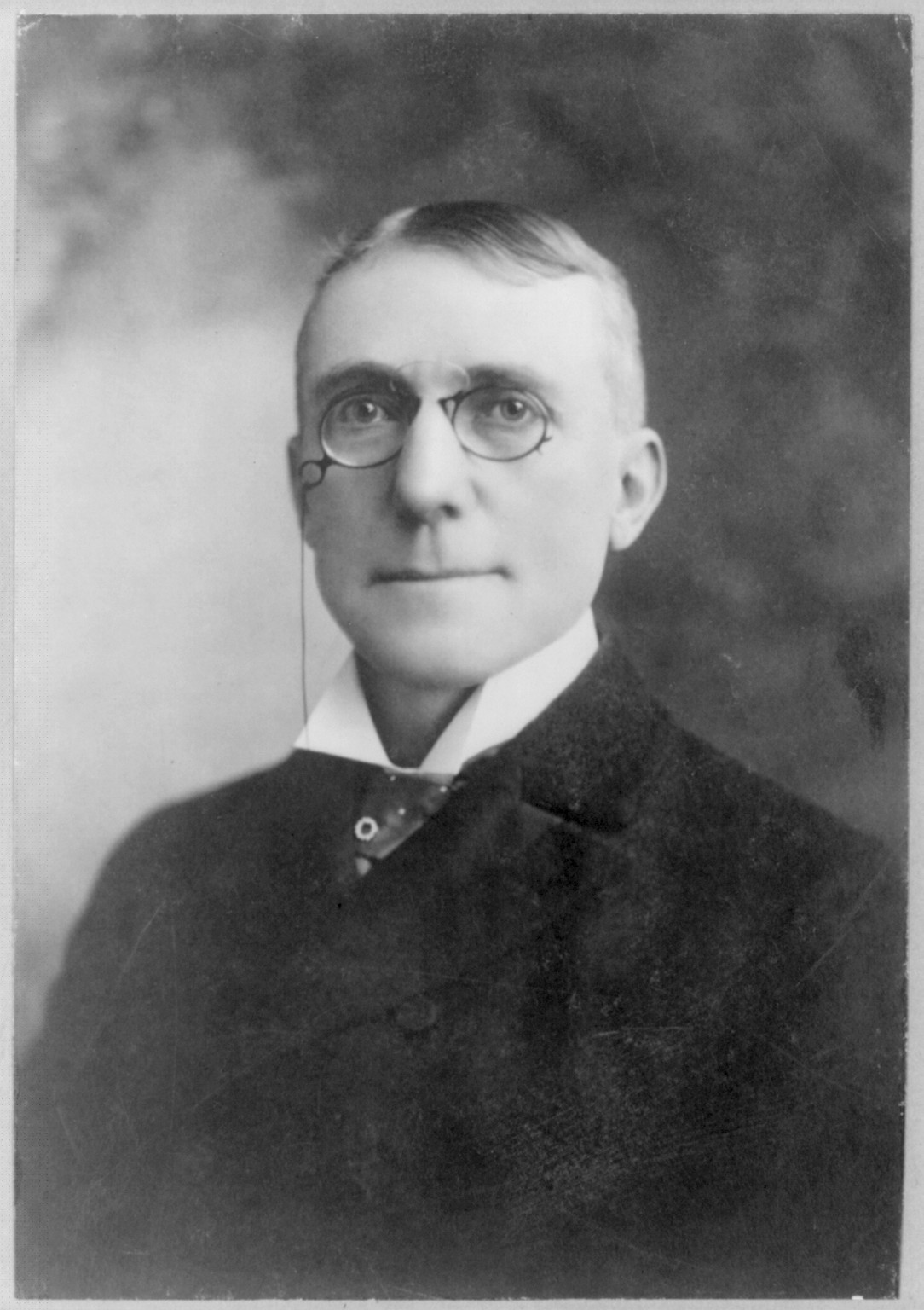 [James Whitcomb Riley, bust portrait, facing left], c1898. — historic photograph