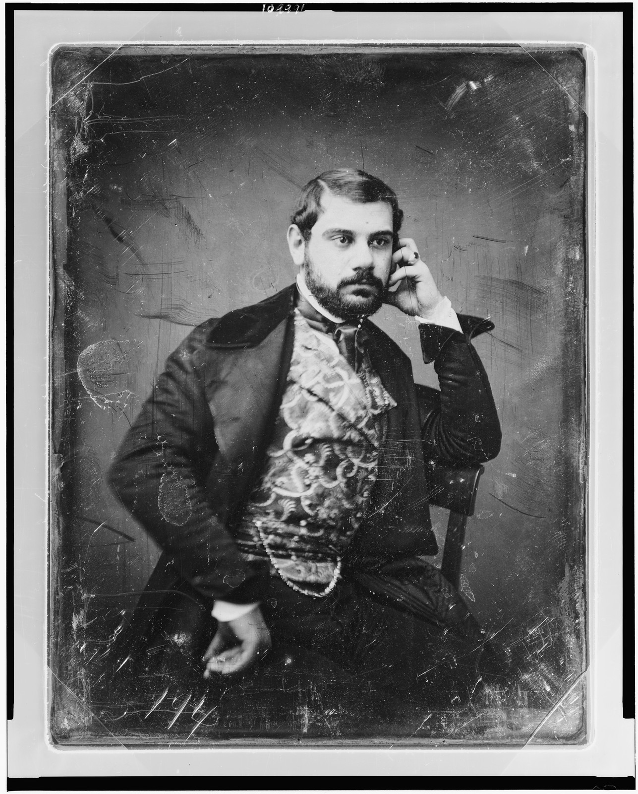 [Sesto Benedetti, three-quarter length portrait, facing three-quarters to right, with beard, sitting in chair, wearing large ring and figured waistcoat], [between 1844 and 1860] — historic photograph