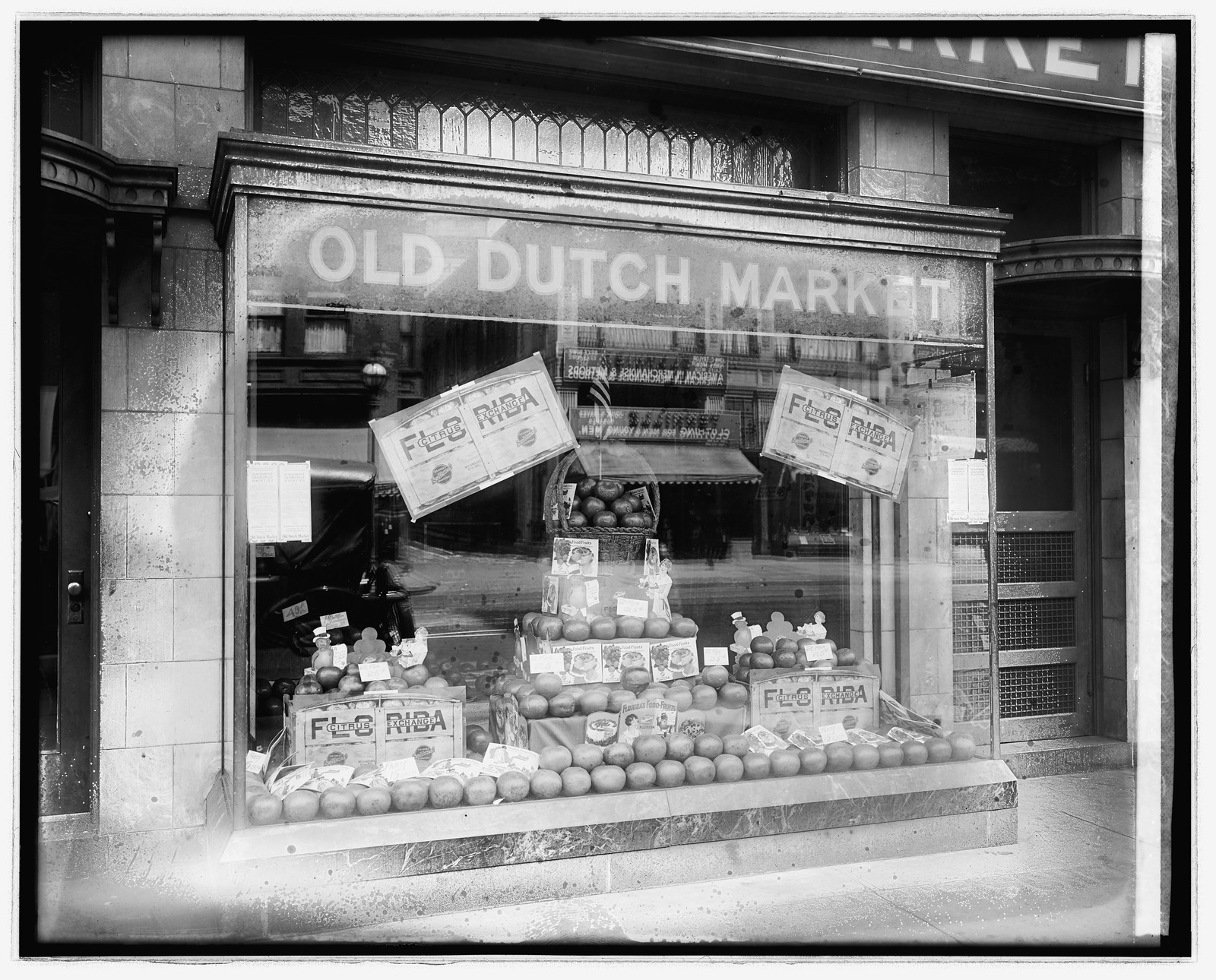 Old Dutch Mkt. Co. window, 906 G St., N.W., [Washington, D.C.], [ca. 1920] — historic photograph