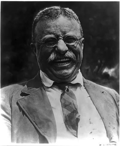 [Theodore Roosevelt, head-and-shoulders candid portrait, facing front, laughing] / M.J. Leclerc.