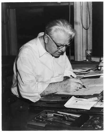 [Frederic] Goudy working on drawings for his University of California Old Style design