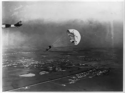 Parachute jump from aeroplane by Geo. Starr, Buffalo, N.Y. / photo by Milton J. Washburn.