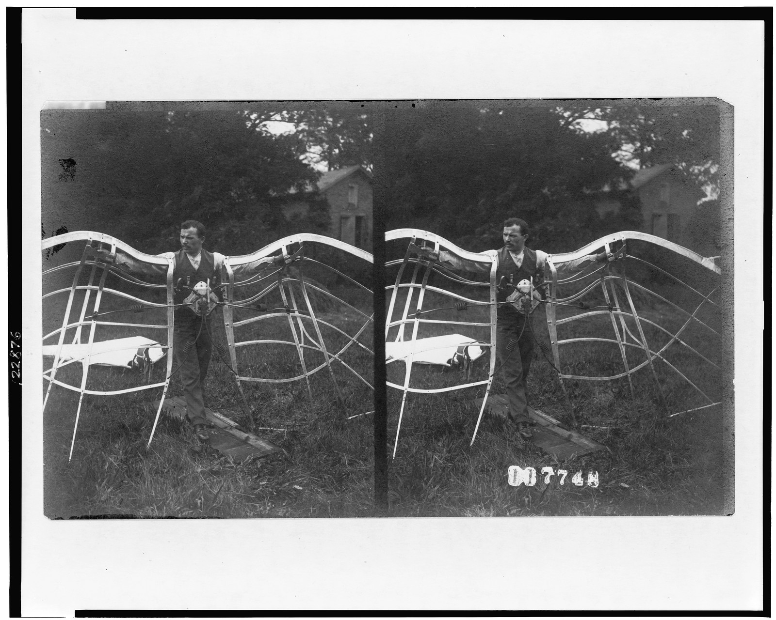 [Stereograph of man with device designed for flying], c1909. — historic photograph