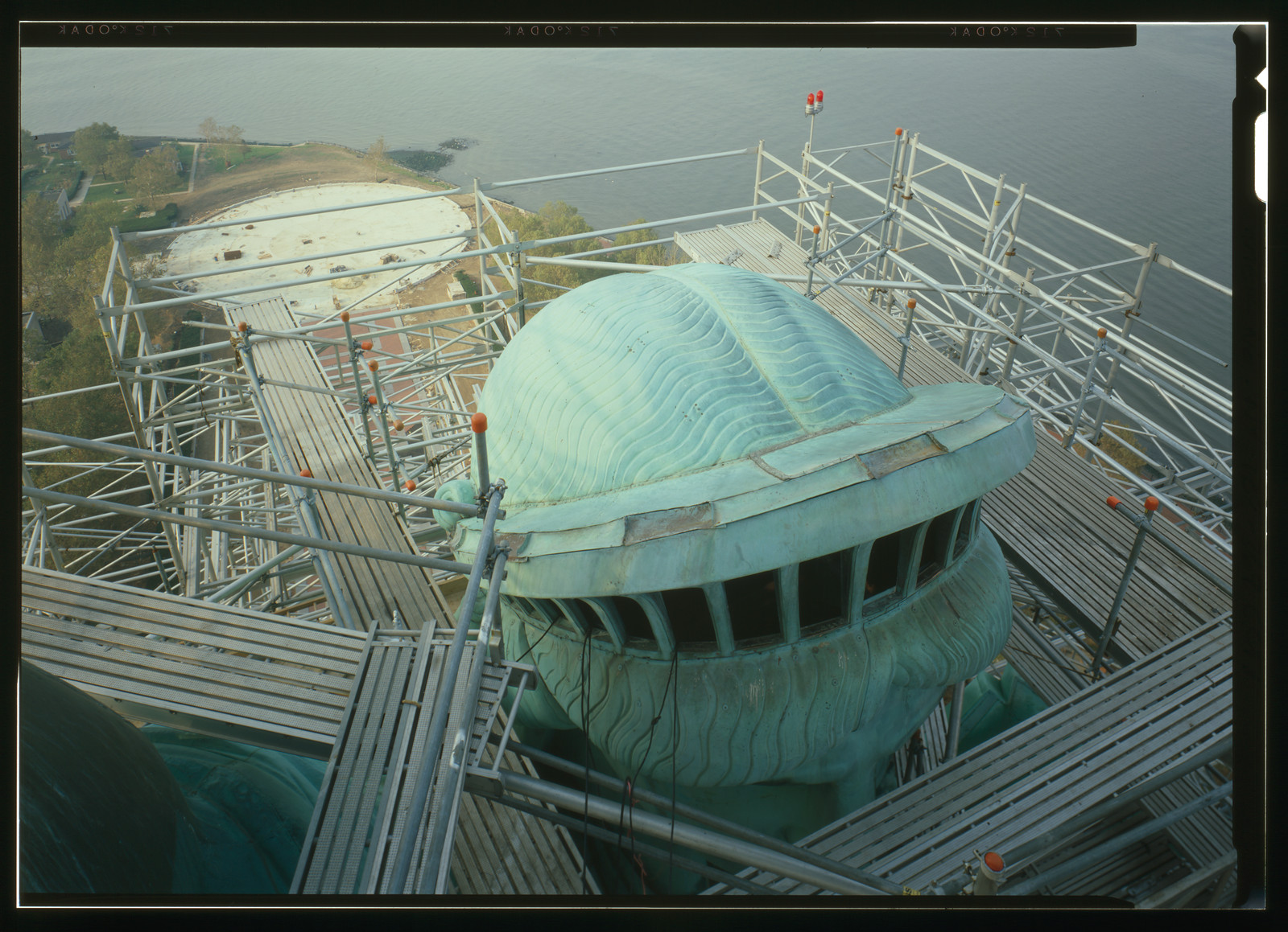Statue of Liberty crown and head with scaffolding — historic image