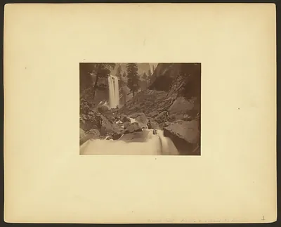 Waterfall above rocky stream, sepia photograph, Yosemite