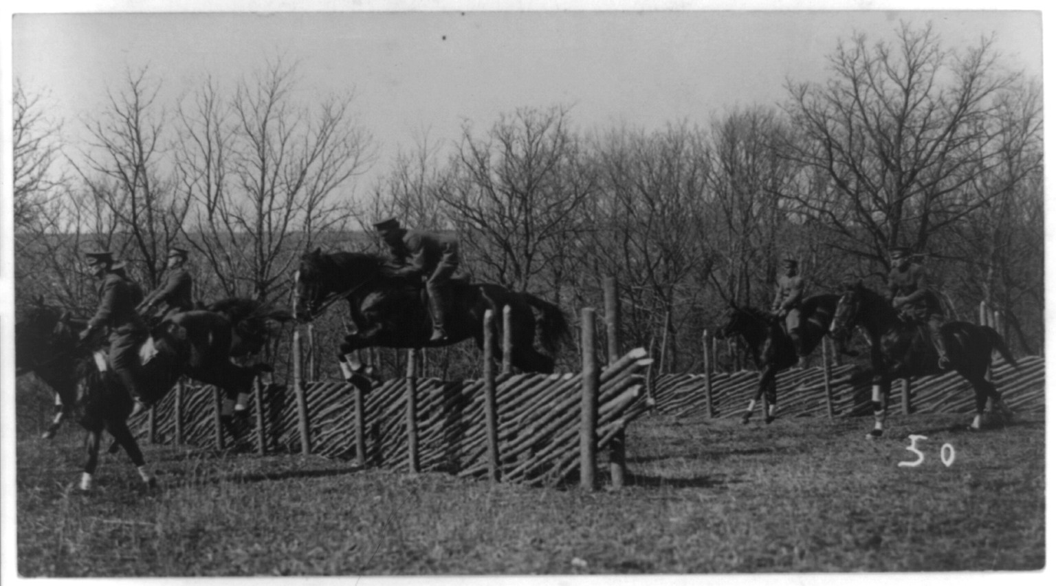[U.S. Army cavalry soldiers: on jumping horses], [between 1910 and 1920] — historic photograph