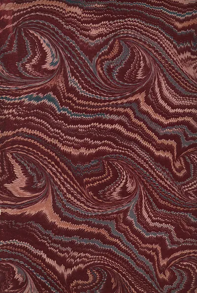 Marbled paper with maroon, pink and blue swirls