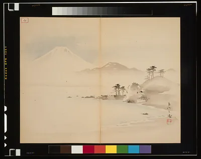 Mount Fuji above a misty shore with pine trees
