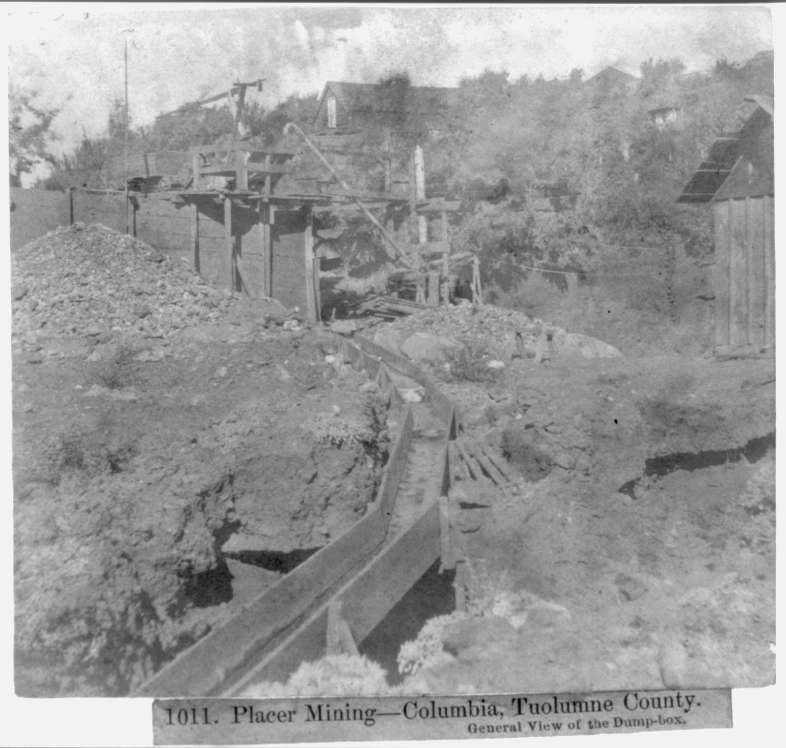 Placer Mining--Columbia, Tuolumne County, General View of the Dump-box, [published 1866] — historic photograph