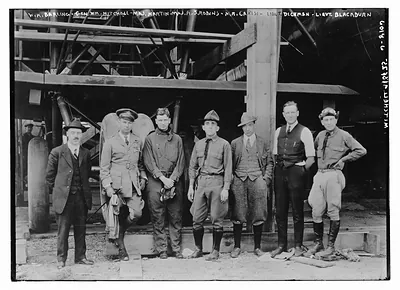 W.H. Barling, Gen. Wm. Mitchell, Maj. Martin, Maj. A.S. Robins, Mr. Carisi, Lt. Dickman, Lt. Blackburn