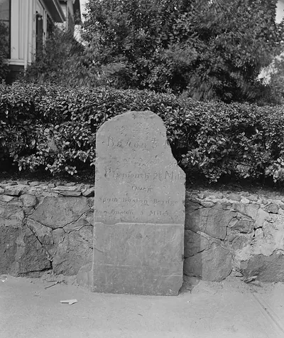Boston milestone reading Boston 6 miles, Plymouth 26 miles