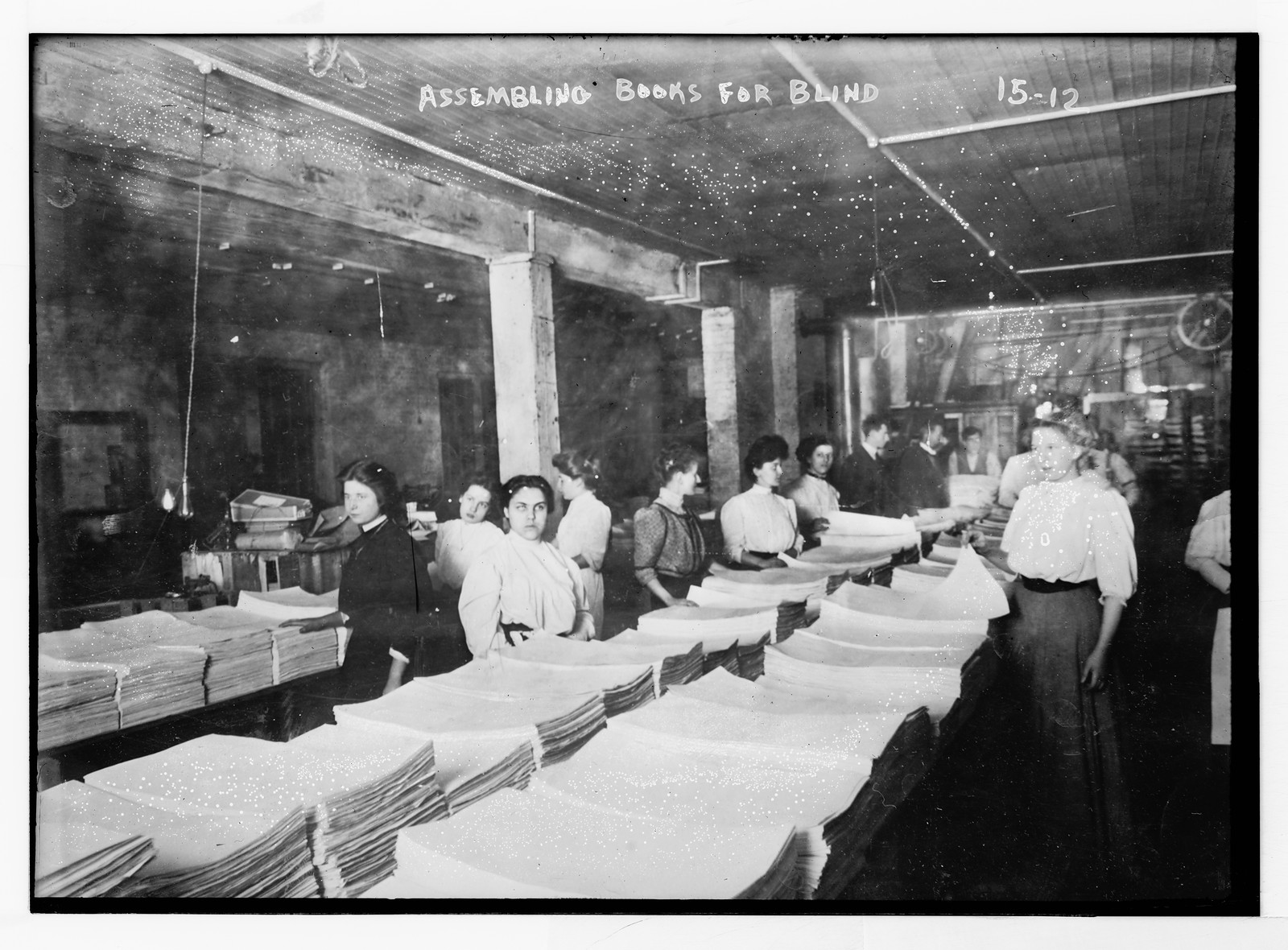 Assembling books for blind, n/a — historic photograph
