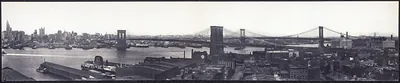 Panoramic view of East River with Manhattan skyline and bridges
