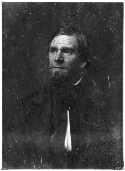 Bearded man in dark early portrait photograph
