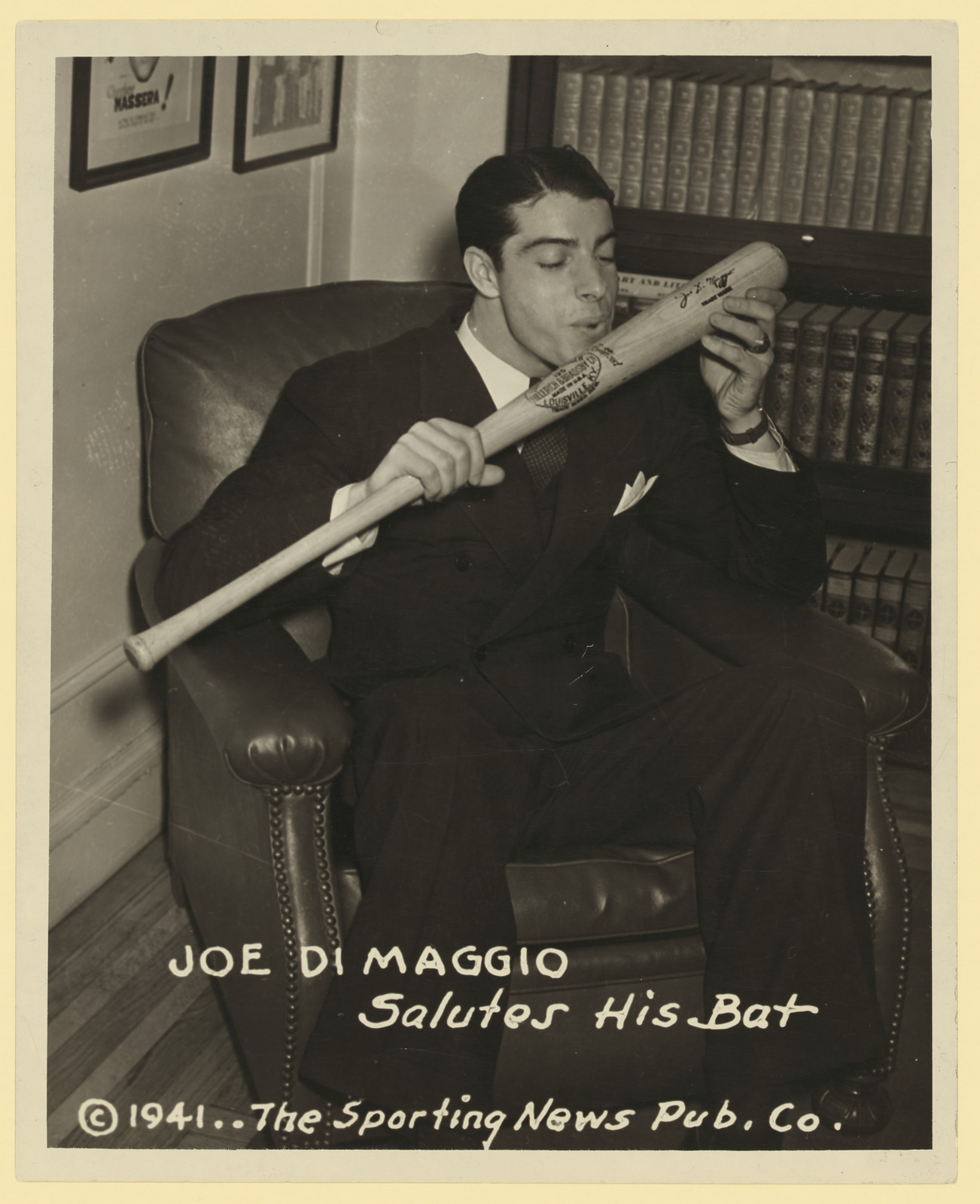 Joe DiMaggio Salutes His Bat, 1941 photograph — historic photograph