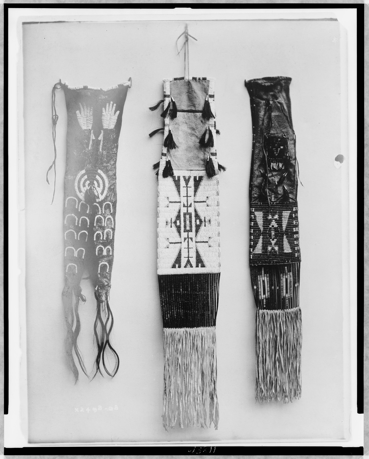 Pipe bags, c1908. — historic photograph