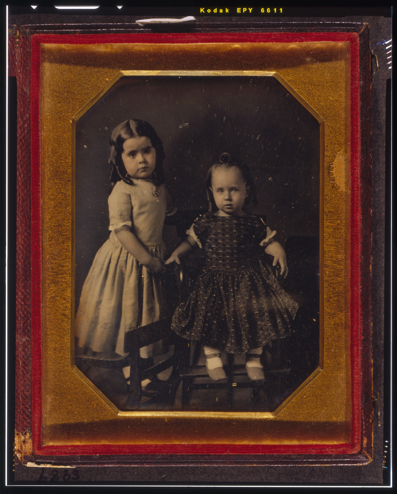 [Elisa and John McAllister, children of W.Y. McAllister, Elisa standing on chair, John sitting in high chair], 1849, July 23. — historic photograph