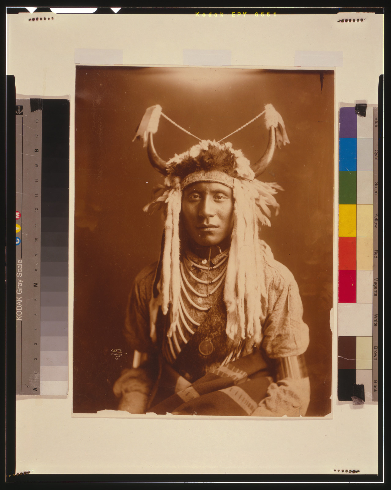 Head Carry, c1900. — historic photograph